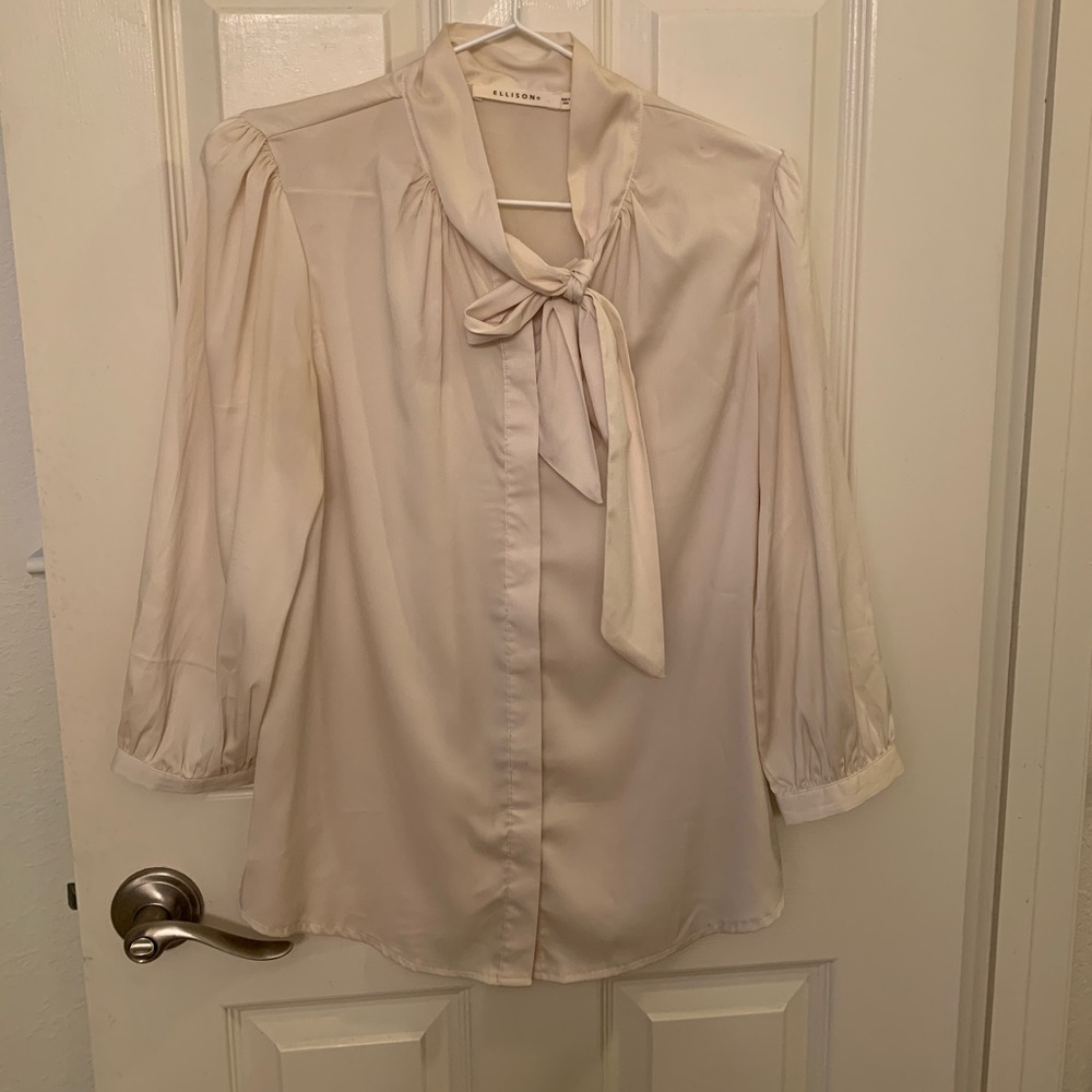Women’s beautiful pearl off-white blouse